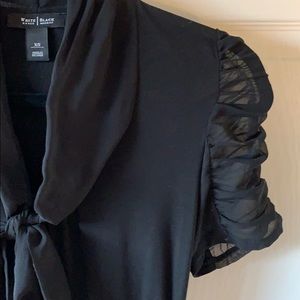 Black blouse with see through ruffled sleeves